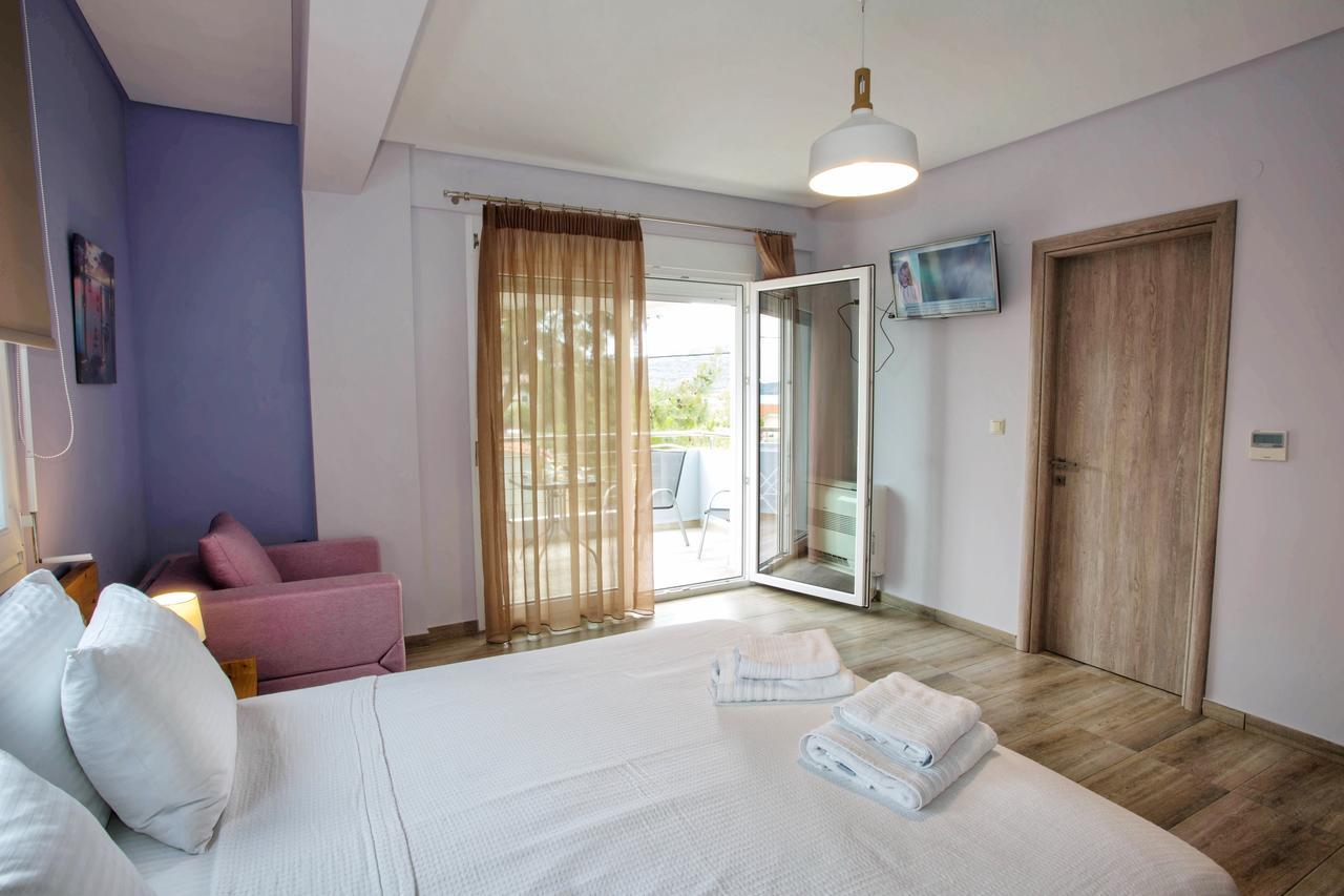 Isalos Suites Néa Péramos Екстериор снимка