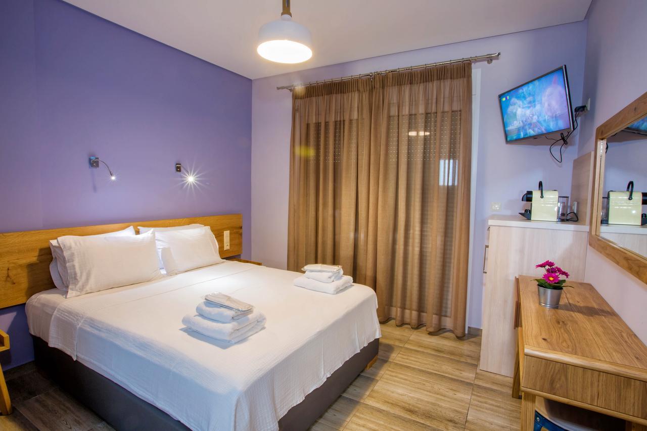 Isalos Suites Néa Péramos Екстериор снимка