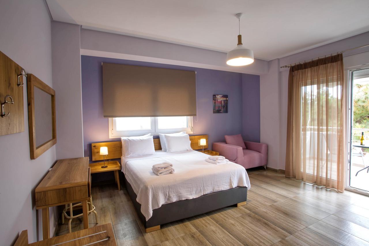 Isalos Suites Néa Péramos Екстериор снимка