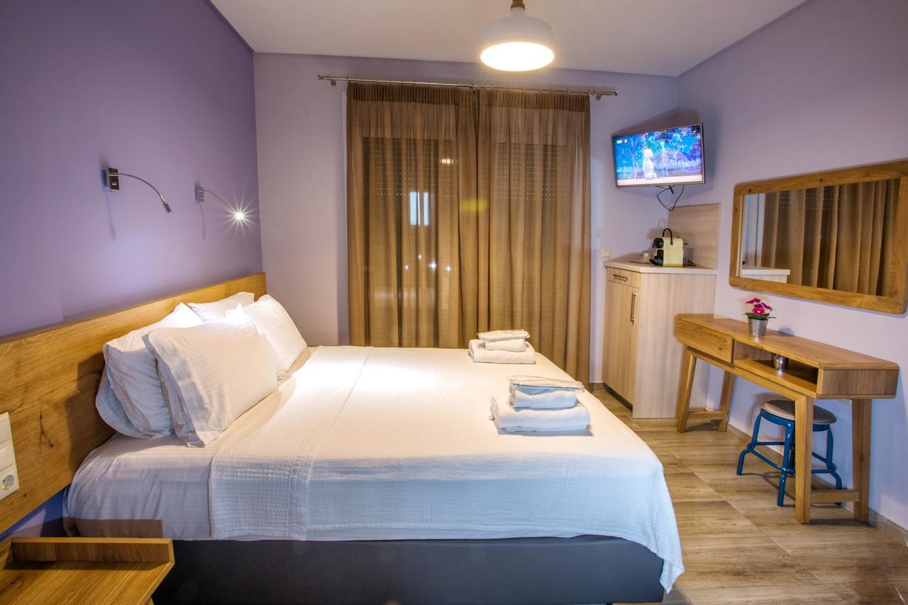 Isalos Suites Néa Péramos Екстериор снимка